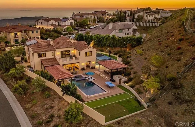a outdoor space with lots of chairs and mirrors