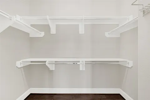 a view of a room with racks on the wall