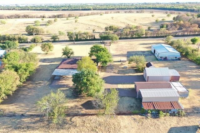 2.02 Acres - Home - Barndominium and Multiple outbuildings with metal roofing.