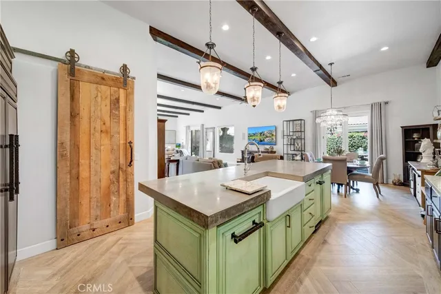a kitchen with a stove and cabinets