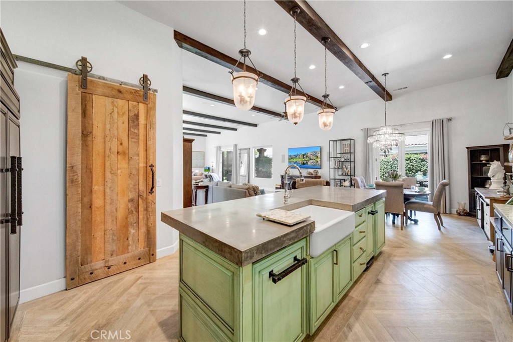 57721 Santa Rosa Trail La Quinta, CA 92253 - Photo 14 of 68 a large white kitchen with a large window