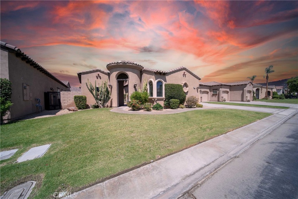 57721 Santa Rosa Trail La Quinta, CA 92253 - Photo 4 of 68 a front view of a house with a yard