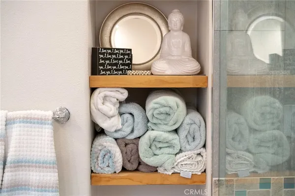 a view of a patio with couches chairs and a potted plant
