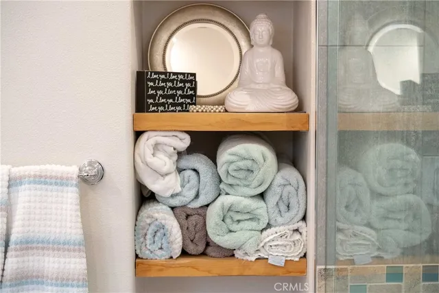 a view of a patio with couches chairs and a potted plant