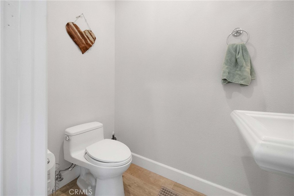 57721 Santa Rosa Trail La Quinta, CA 92253 - Photo 43 of 68 a white toilet sitting next to a white sink