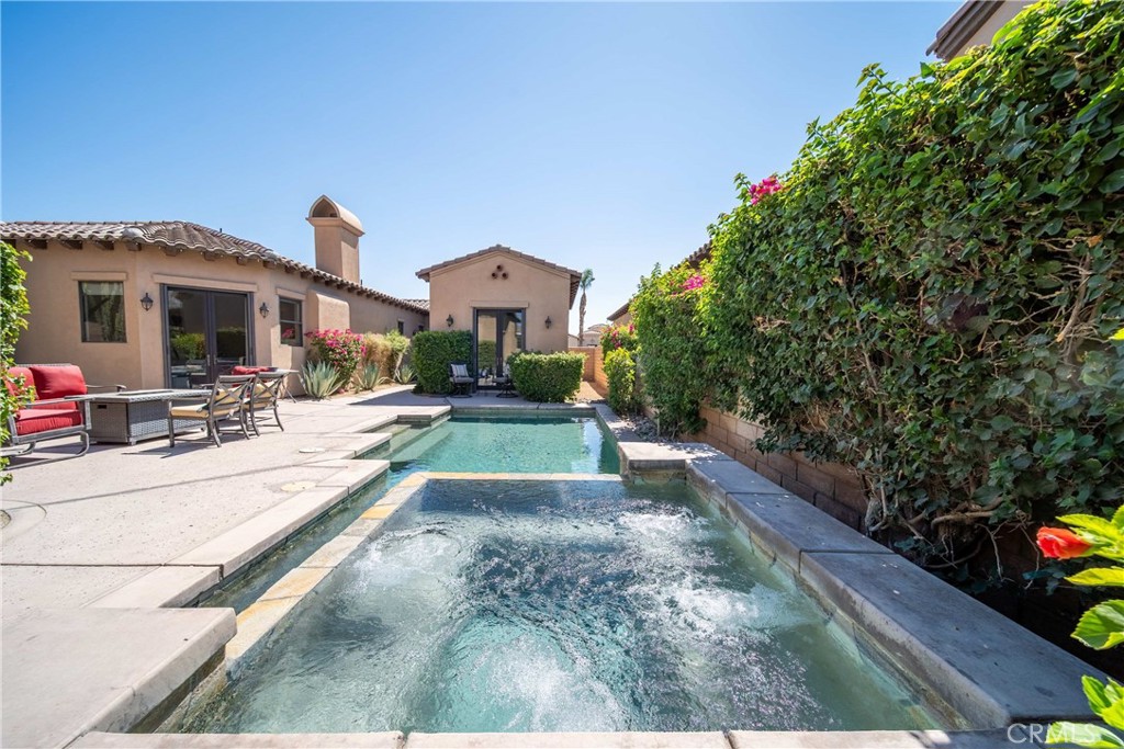 57721 Santa Rosa Trail La Quinta, CA 92253 - Photo 47 of 68 a view of a garden with a patio