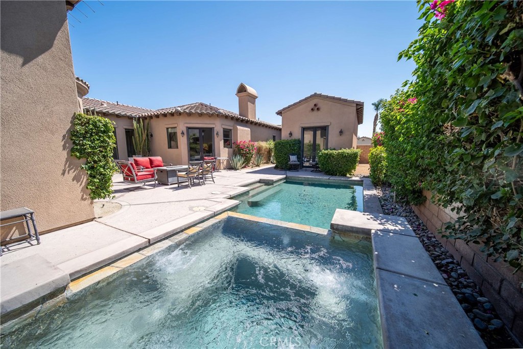 57721 Santa Rosa Trail La Quinta, CA 92253 - Photo 49 of 68 swimming pool view with a seating space