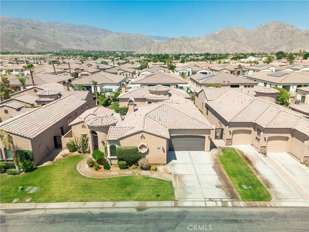 57721 Santa Rosa Trail La Quinta, CA 92253 - Photo 64 of 68 an aerial view of residential houses with outdoor space