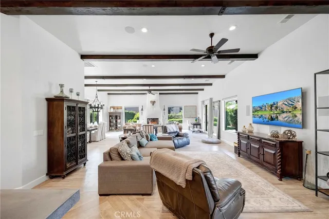 a large kitchen with granite countertop a stove oven and a sink with granite countertops