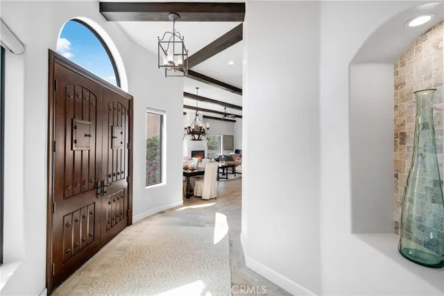 a large kitchen with cabinets and stainless steel appliances