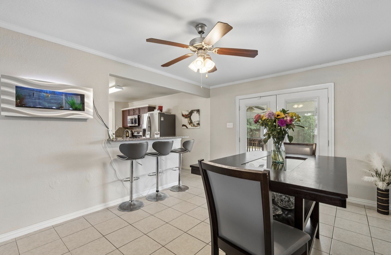 7118 Rising Brook Drive Cypress, TX 77433 - Photo 7 of 21 a view of a dining room with furniture and wooden floor