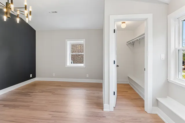 a bathroom with a toilet and a bathtub