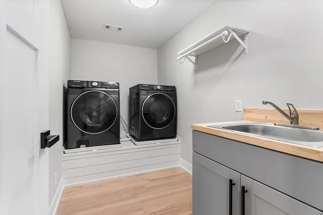 a view of a livingroom with wooden floor
