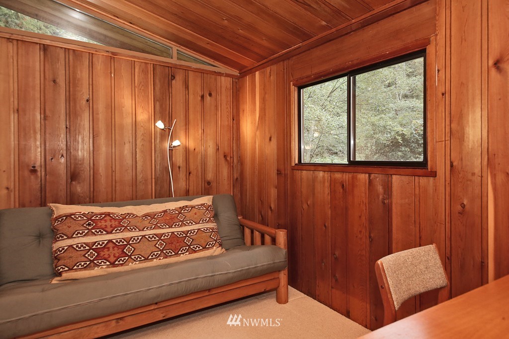 4576 South June Beach Road Freeland, WA 98249 - Photo 15 of 25 a view of a room with furniture and walls