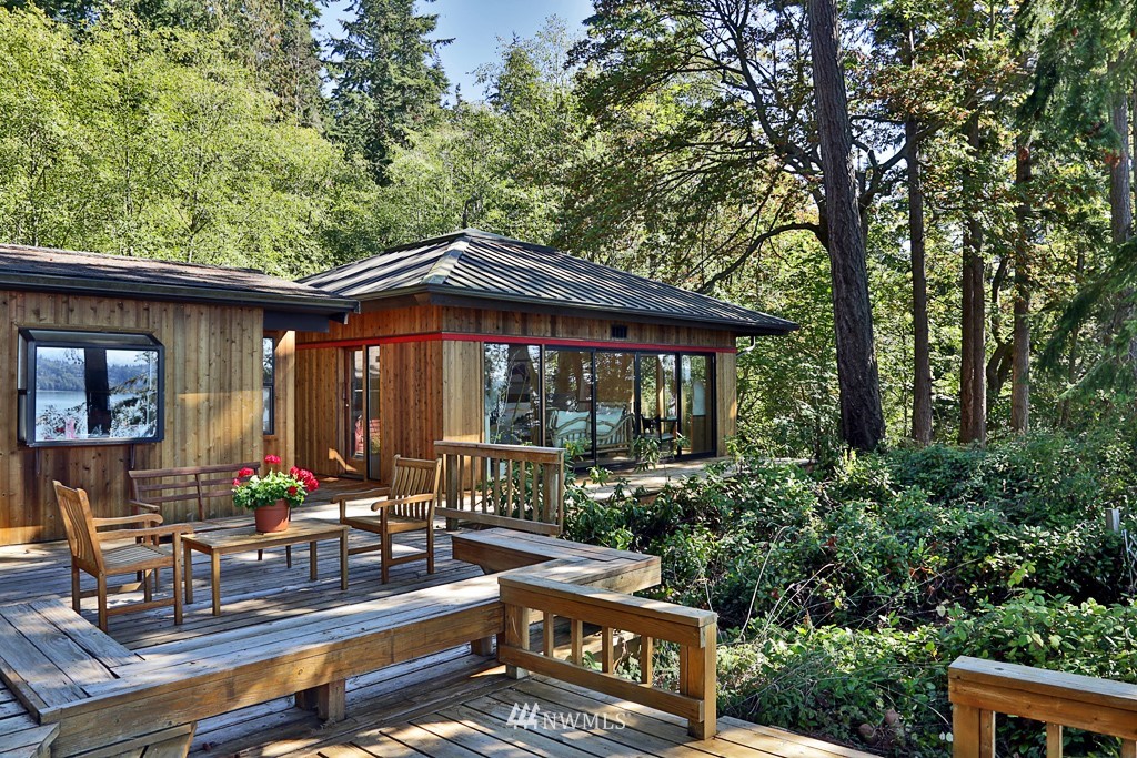4576 South June Beach Road Freeland, WA 98249 - Photo 3 of 25 an outdoor sitting area with furniture and garden view