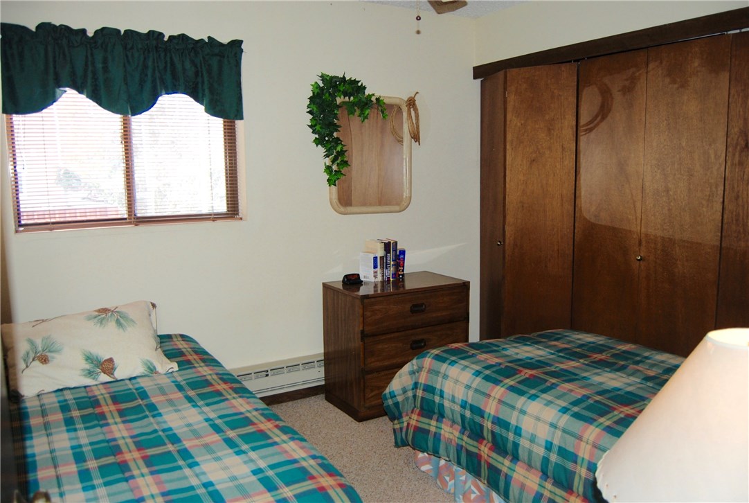 6915 Ryan Gulch Road, Unit 6915 Silverthorne, CO 80498 - Photo 12 of 14 Bedroom 3
