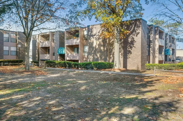 a view of a building with a street