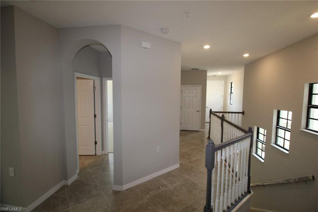 10539 Casella Way, Unit 202 Fort Myers, FL 33913 - Photo 4 of 28 a view of hallway with stairs