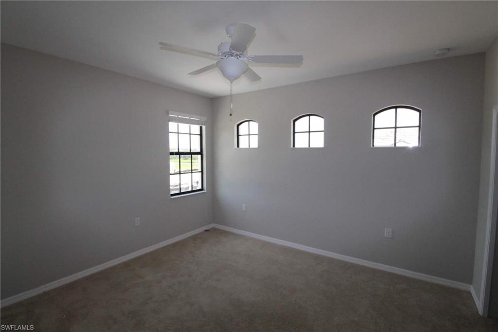 10539 Casella Way, Unit 202 Fort Myers, FL 33913 - Photo 7 of 28 an empty room that has a window