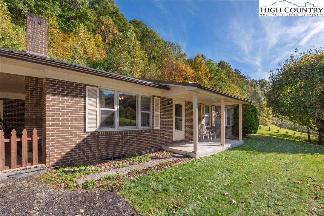 4934 Silas Creek Road Lansing, NC 28643 - Photo 13 of 32 front view of a house with a yard