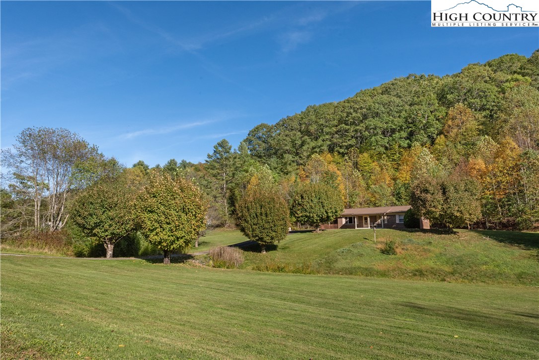 4934 Silas Creek Road Lansing, NC 28643 - Photo 32 of 32 a view of a water with mountain