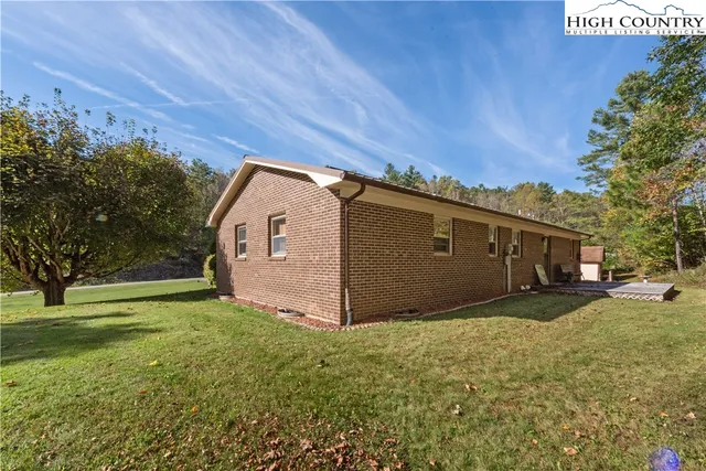 a view of a backyard of the house