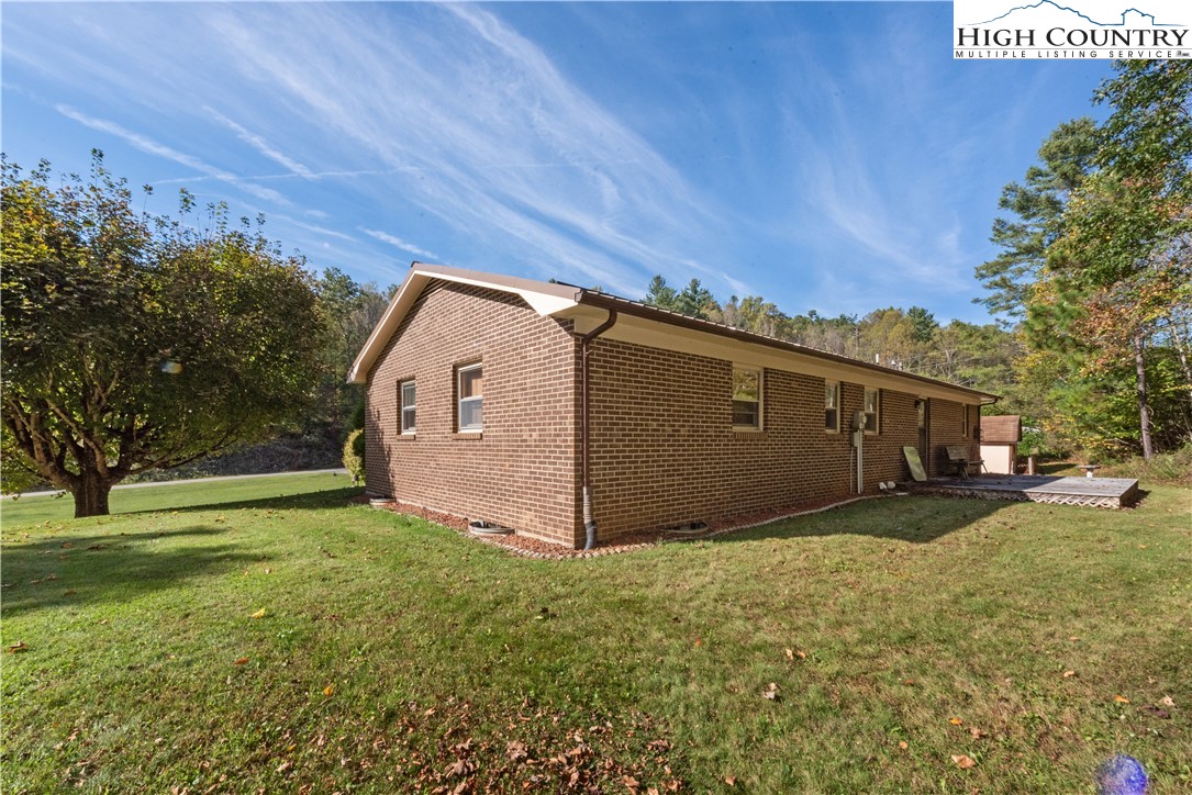 4934 Silas Creek Road Lansing, NC 28643 - Photo 6 of 32 a view of a backyard of the house