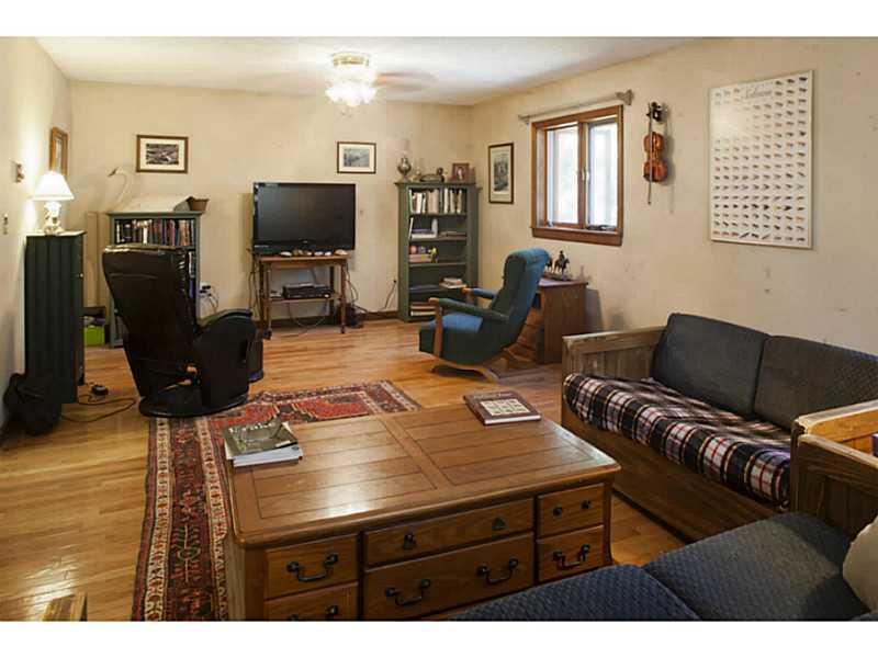 38 Hopkins Road Hampden, ME 04444 - Photo 7 of 33 Living Room. 25 long qualifies as a...