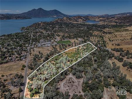 14142 Burns Valley Road Clearlake, CA 95422 - Photo 1 of 36 a view of a city with a mountain