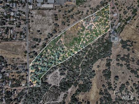 14142 Burns Valley Road Clearlake, CA 95422 - Photo 2 of 36 a view of a yard with wooden fence