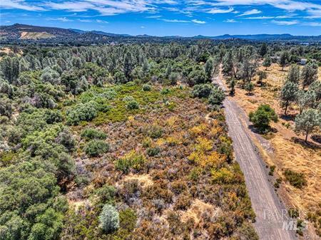 14142 Burns Valley Road Clearlake, CA 95422 - Photo 32 of 36 a view of a city with green mountains