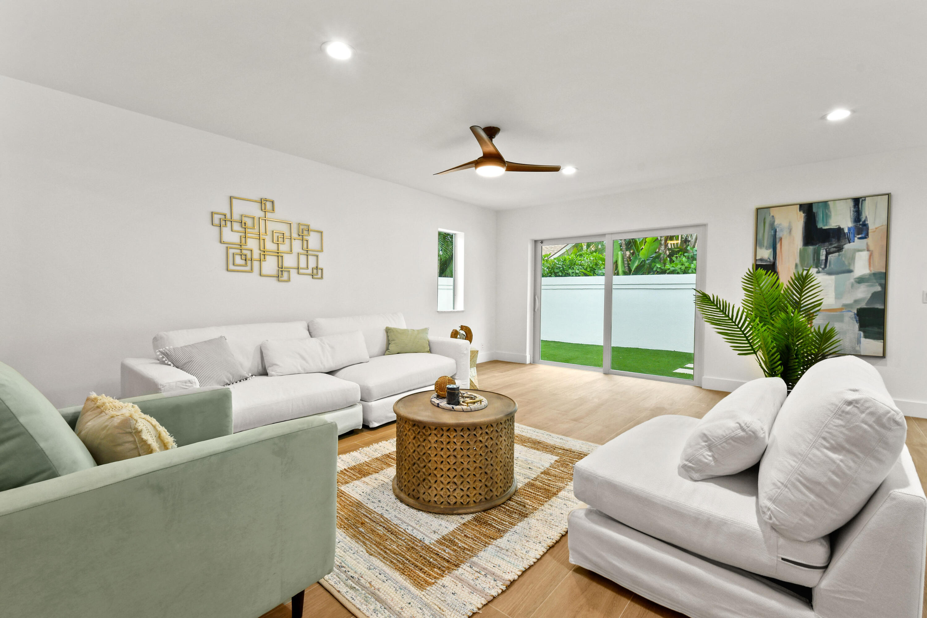 114 Inner Harbour Way Jupiter, FL 33477 - Photo 11 of 38 a living room with furniture and a large window