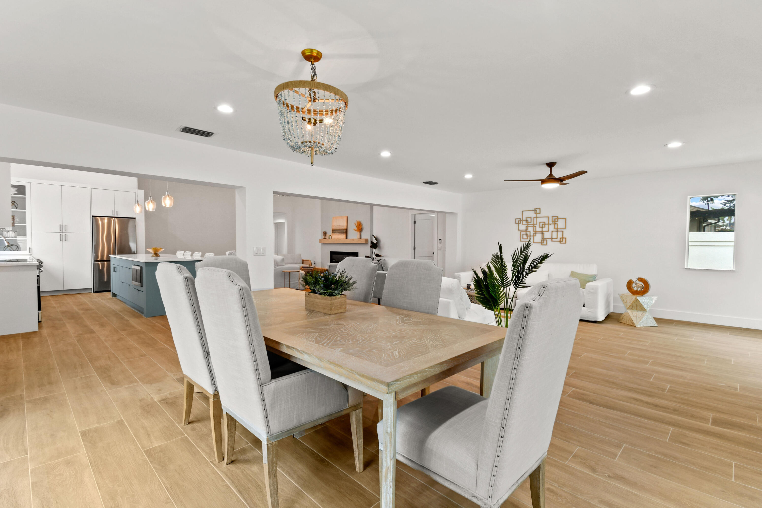 114 Inner Harbour Way Jupiter, FL 33477 - Photo 15 of 38 a view of a dining room with furniture and wooden floor