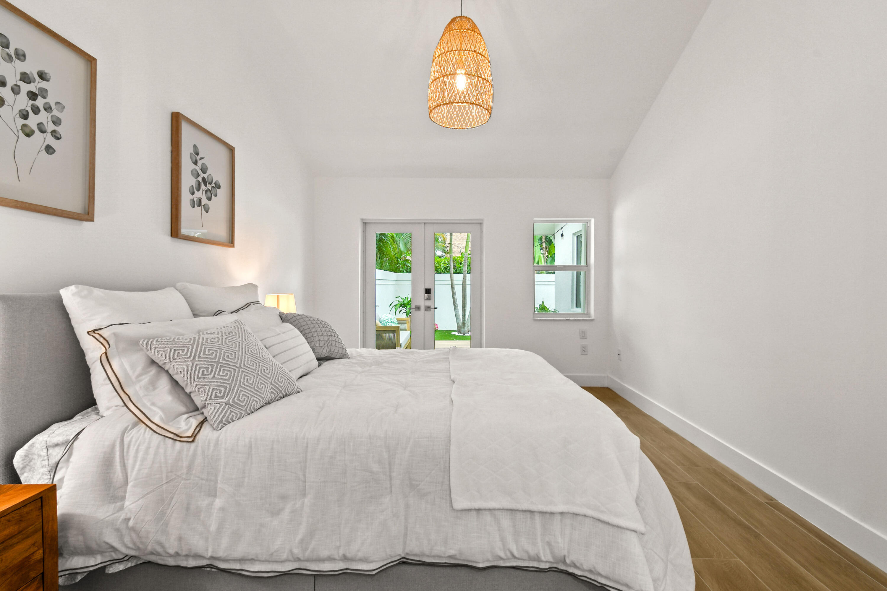 114 Inner Harbour Way Jupiter, FL 33477 - Photo 17 of 38 a bedroom with a bed and a window