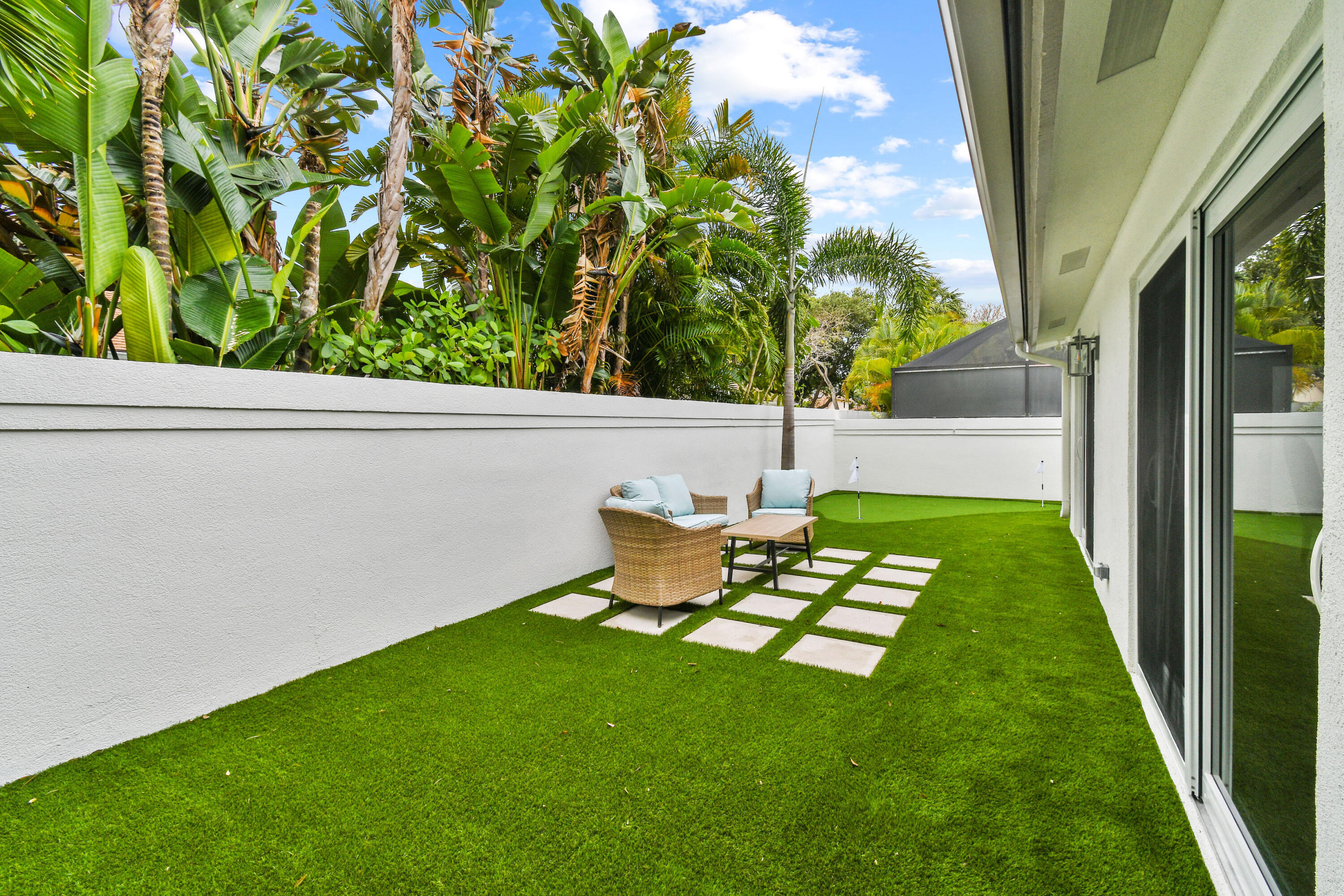 114 Inner Harbour Way Jupiter, FL 33477 - Photo 36 of 38 a view of yard with seating area