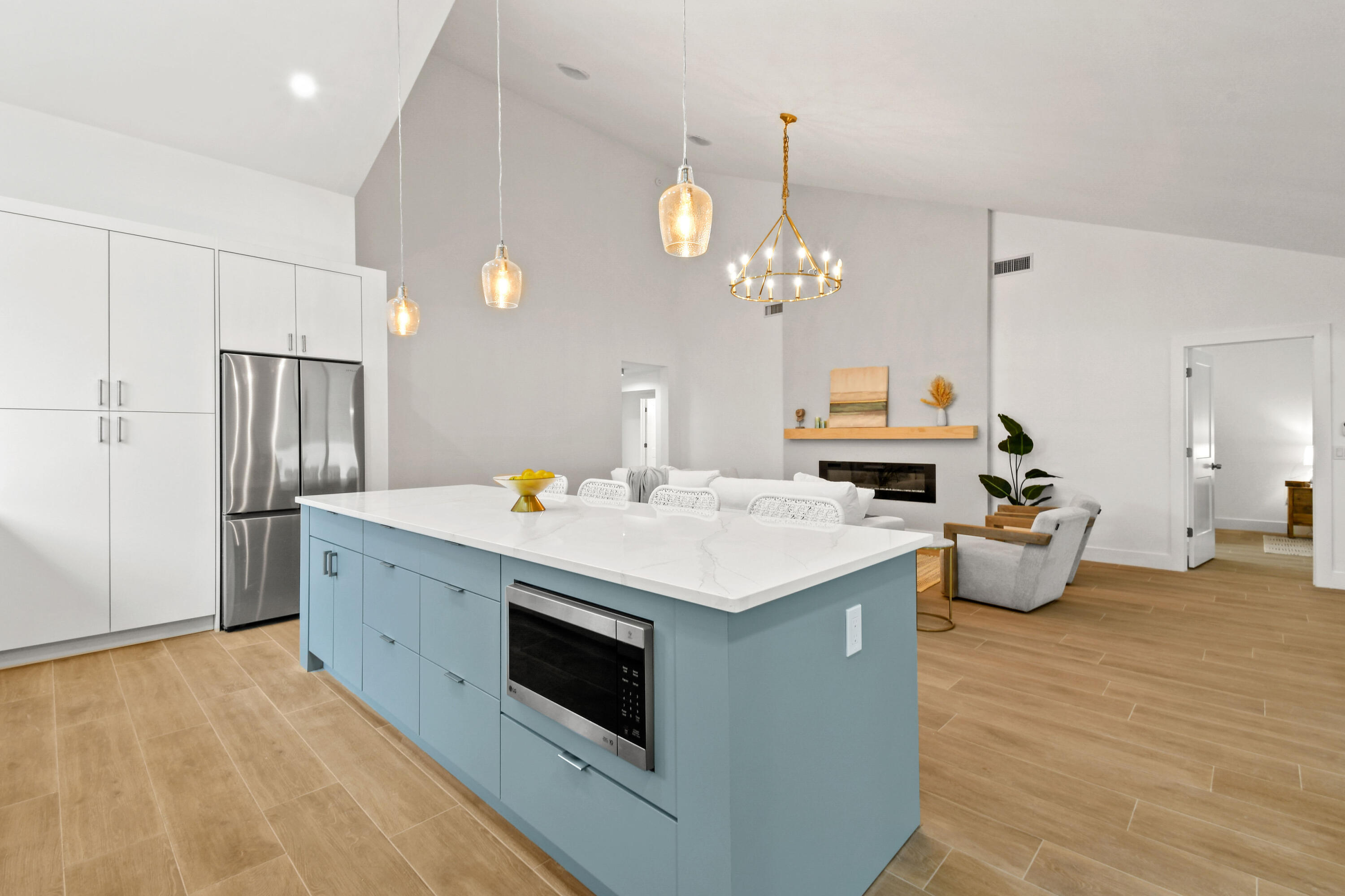 114 Inner Harbour Way Jupiter, FL 33477 - Photo 6 of 38 a kitchen that has a lot of white cabinets and stainless steel appliances