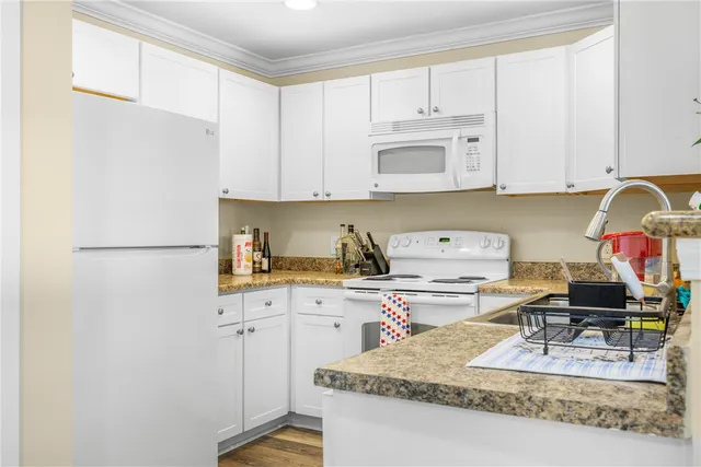 a bedroom with a bed and a cabinets