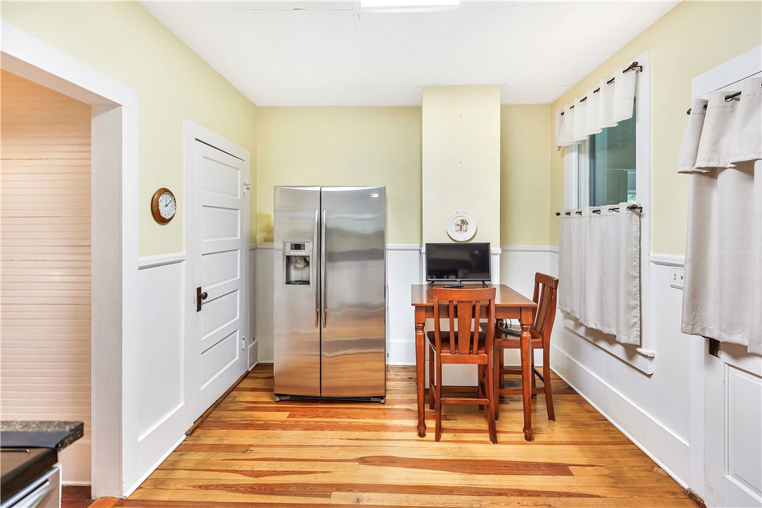 205 West Mauldin Street Walhalla, SC 29691 - Photo 13 of 43 Functional kitchen space offers bright wood flooring, ample room for casual dining and access to the screened in back porch.