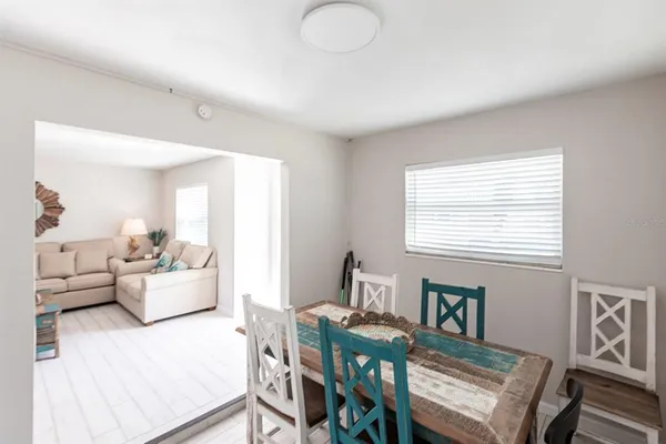 a view of a livingroom with furniture and windows