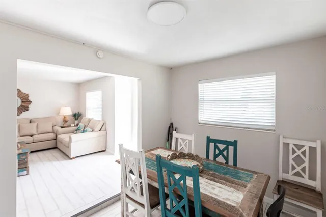 a view of a livingroom with furniture and windows