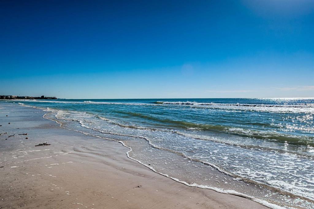 6020 Midnight Pass Road, Unit 52A Sarasota, FL 34242 - Photo 28 of 28 a view of an ocean beach