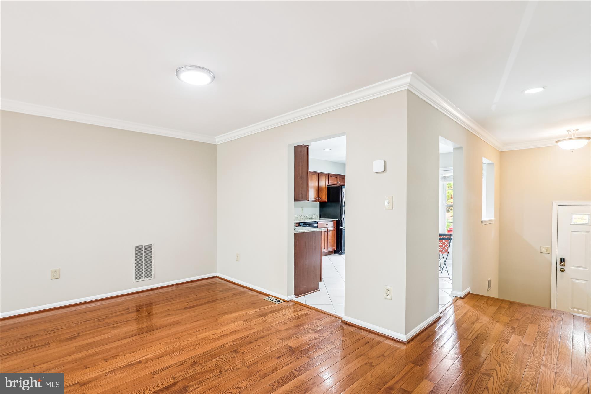 7708 Shootingstar Drive Springfield, VA 22152 - Photo 14 of 62 a view of empty room with wooden floor