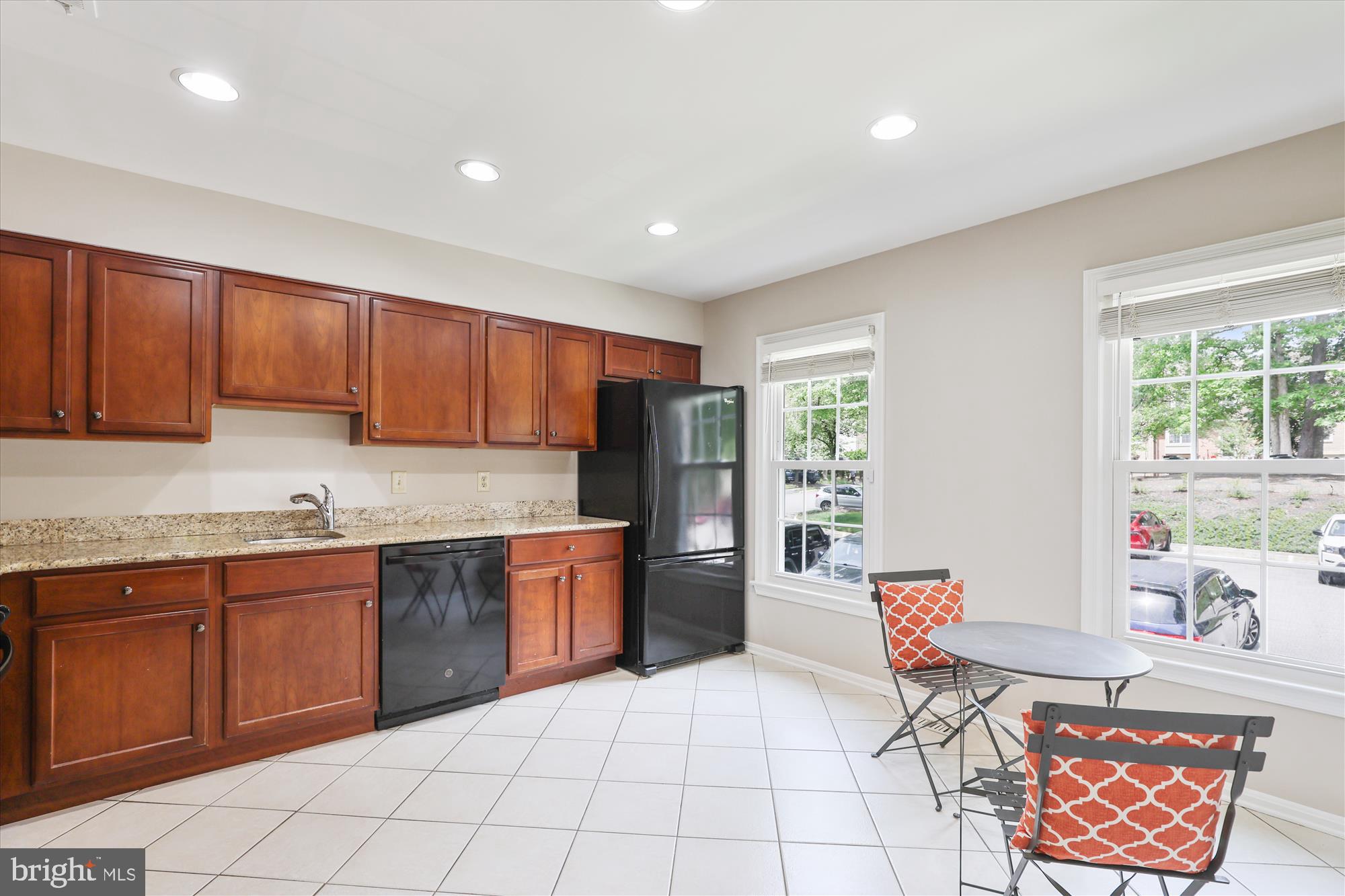 7708 Shootingstar Drive Springfield, VA 22152 - Photo 15 of 62 a kitchen with stainless steel appliances granite countertop a stove top oven a sink dishwasher and cabinets