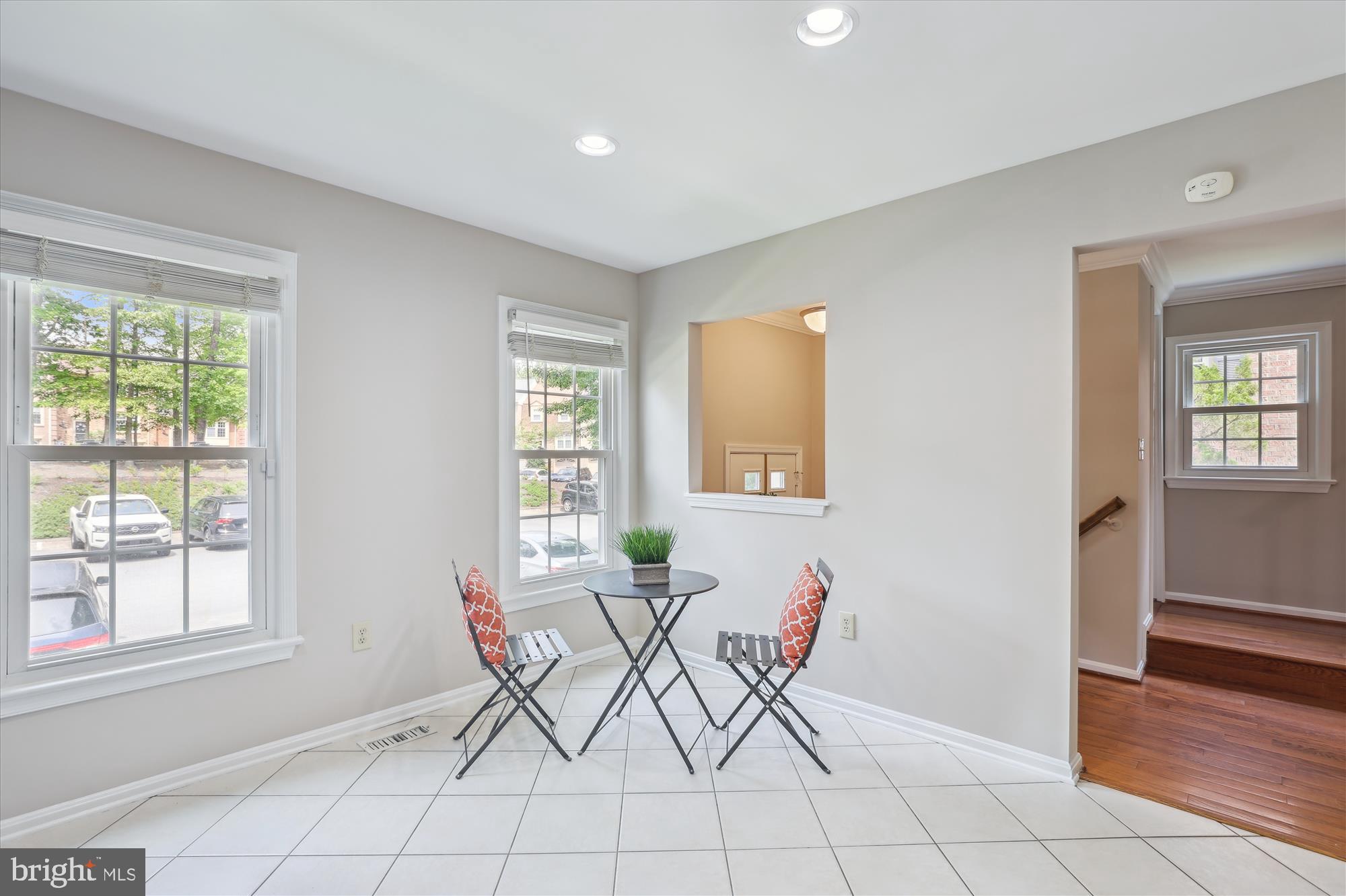 7708 Shootingstar Drive Springfield, VA 22152 - Photo 19 of 62 a view of a livingroom with furniture and windows