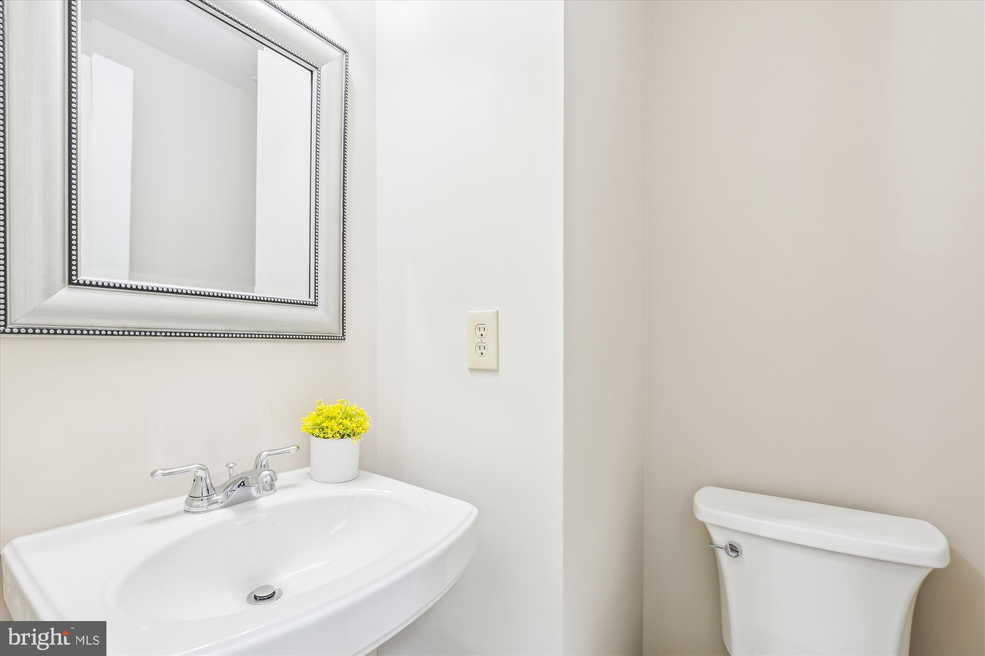 7708 Shootingstar Drive Springfield, VA 22152 - Photo 20 of 62 a bathroom with a sink and a toilet
