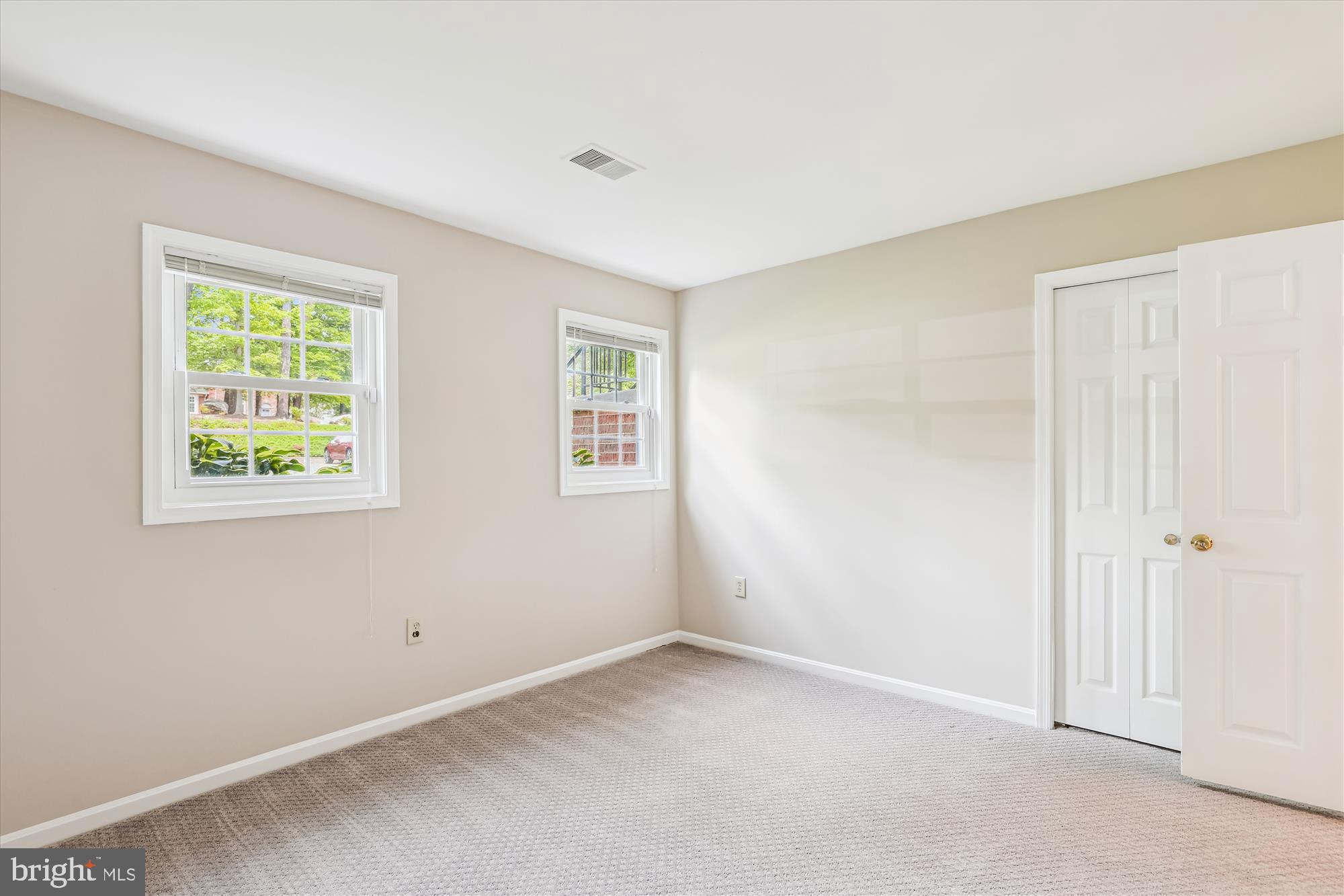 7708 Shootingstar Drive Springfield, VA 22152 - Photo 39 of 62 an empty room with windows