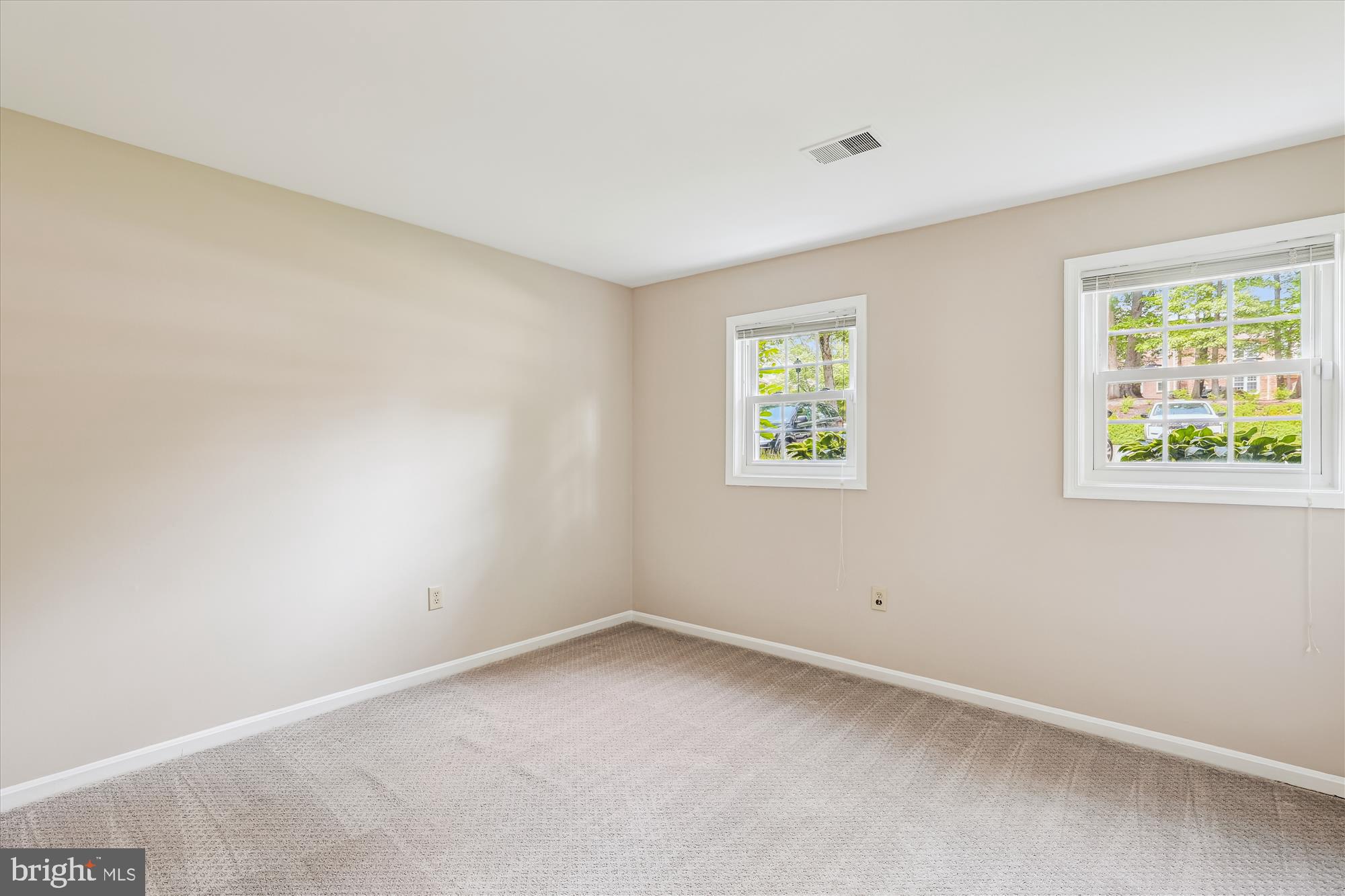 7708 Shootingstar Drive Springfield, VA 22152 - Photo 40 of 62 an empty room with windows