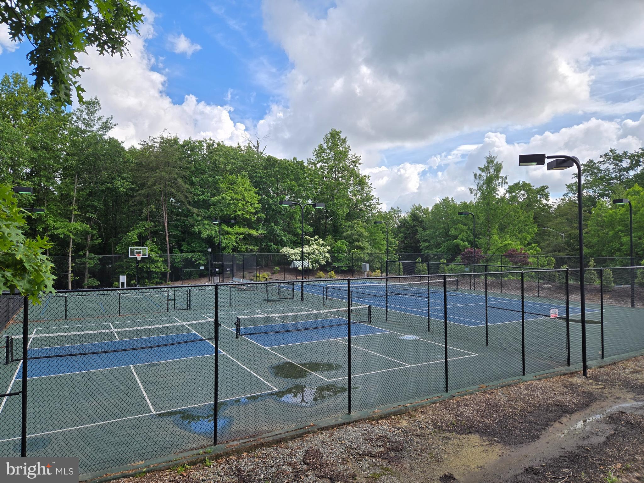 7708 Shootingstar Drive Springfield, VA 22152 - Photo 54 of 62 a view of a tennis court