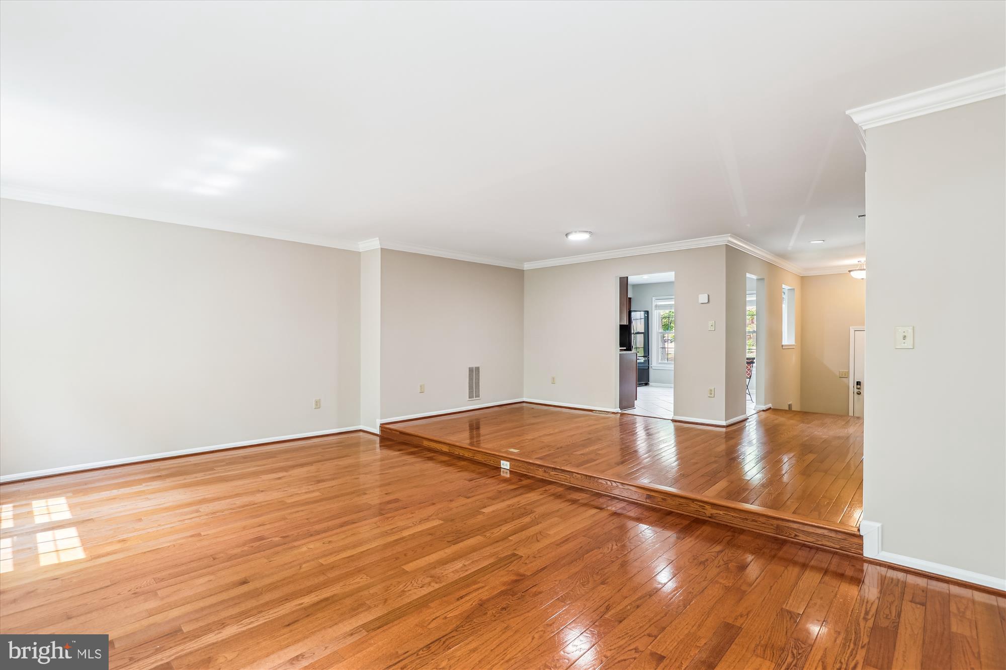7708 Shootingstar Drive Springfield, VA 22152 - Photo 9 of 62 a view of empty room with wooden floor