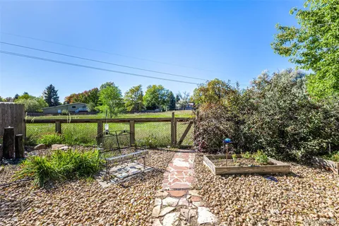 a garden view with a seating space